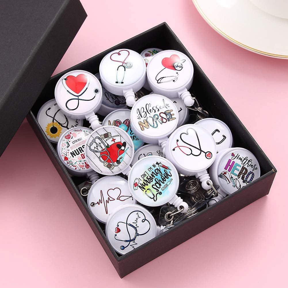 Llavero retráctil de enfermera de tubo de aguja de estetoscopio ABS al por mayor